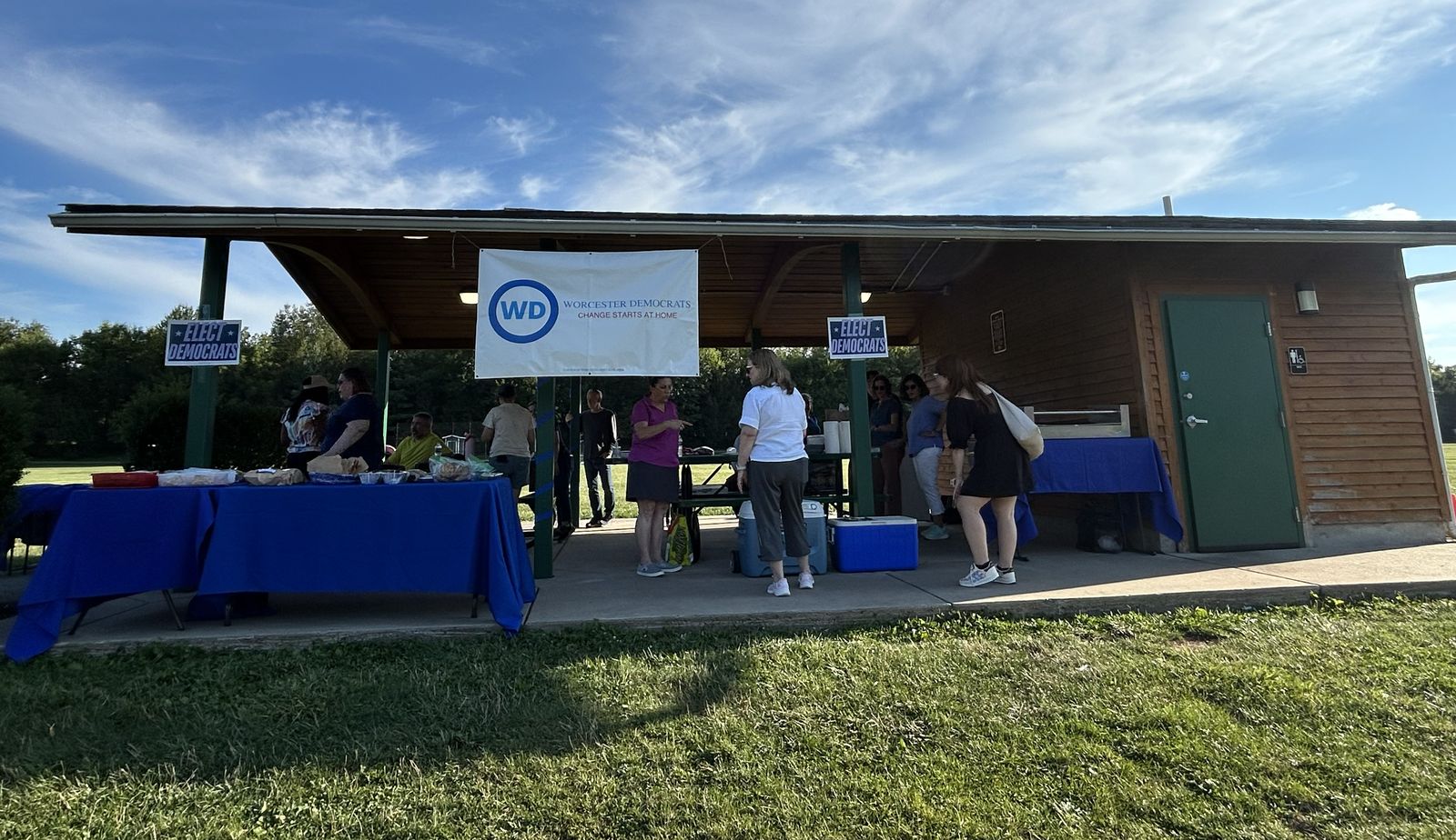 Worcester Democrats members and neighbors gathered at a community event under the Worcester Democrats banner